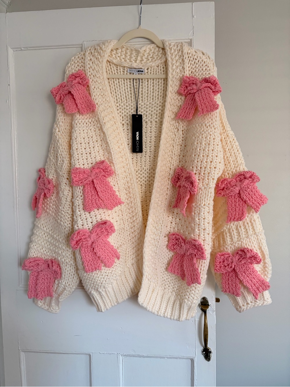 FASHION NOVA Cream Chunky Knit Cardigan with Pink Bow Accents